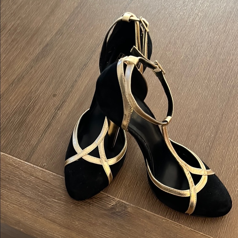 Madonna Black and Gold Heels with T-Strap Design
